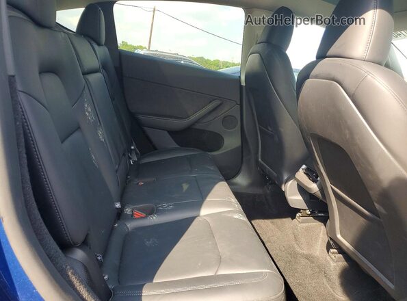 7SAYGDED5SA372763 2025 TESLA MODEL Blue Vista de los asientos traseros
