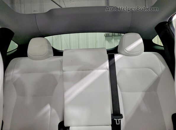 7SAYGDED5TF397635 2026 TESLA MODEL Charcoal Rear seats view