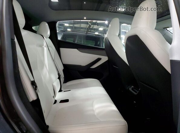 7SAYGDED5TF397635 2026 TESLA MODEL Charcoal Rear interior view