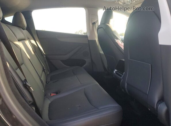 7SAYGDED6TF394811 2026 TESLA MODEL Black Вид задньої частини салону