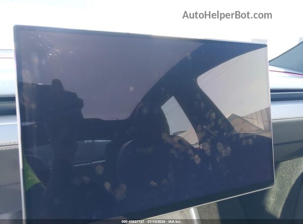 7SAYGDED6TF661140 2026 TESLA MODEL Y Black Rear seats view