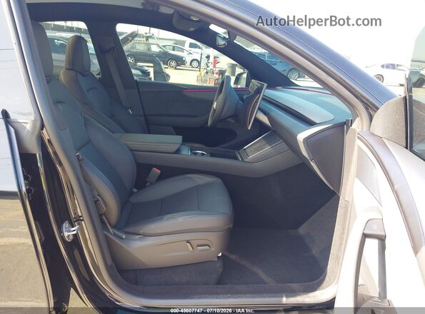 7SAYGDED6TF661140 2026 TESLA MODEL Y Black Front interior view