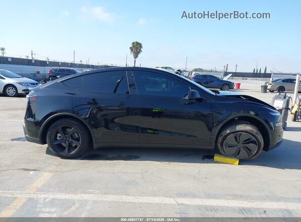 7SAYGDED6TF661140 2026 TESLA MODEL Y Black Rear interior view