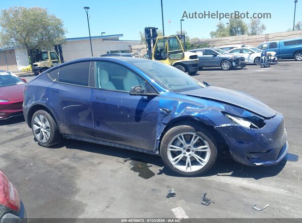 7SAYGDED7PF955961 2023 TESLA MODEL Y Blue Rear interior view