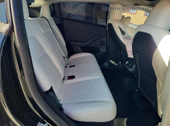 7SAYGDED7RF095045 2024 TESLA MODEL Черный Вид задних сидений