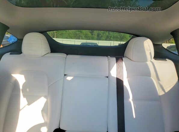 7SAYGDED7SA350991 2025 TESLA MODEL Black Вид задніх сидінь