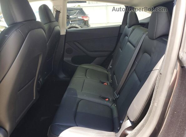 7SAYGDED7SF238291 2025 TESLA MODEL Gray Widok tylnych siedzeń