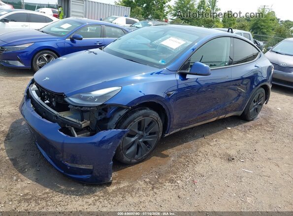 7SAYGDED8RF206301 2024 TESLA MODEL Y Navy Vista tres cuartos delantera izquierda