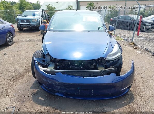 7SAYGDED8RF206301 2024 TESLA MODEL Y Navy Vista frontal