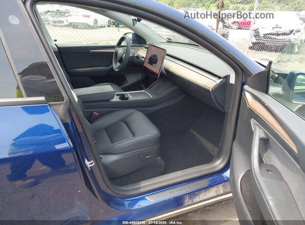 7SAYGDED8RF206301 2024 TESLA MODEL Y Navy Vista interior delantera
