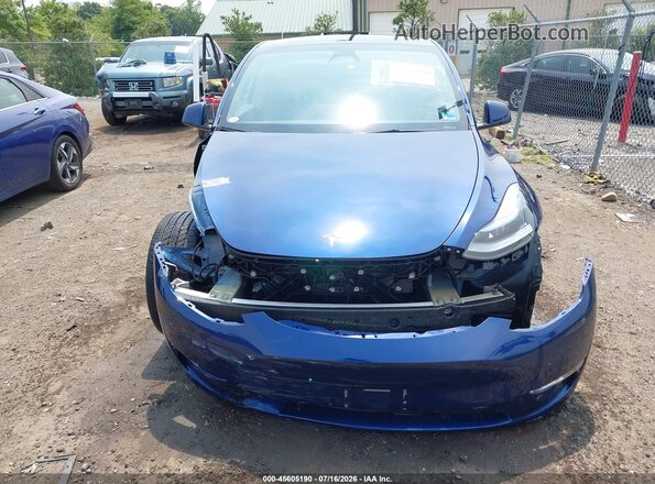 7SAYGDED8RF206301 2024 TESLA MODEL Y Navy Vista interior trasera