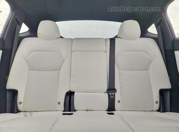 7SAYGDED8TA684593 2026 TESLA MODEL Gray Vista de los asientos traseros