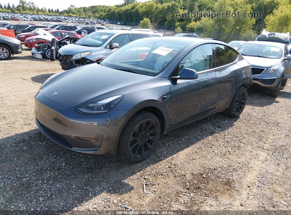 7SAYGDED9PF948106 2023 TESLA MODEL Y Gray Առջևի ձախ երեք քառորդ տեսարան