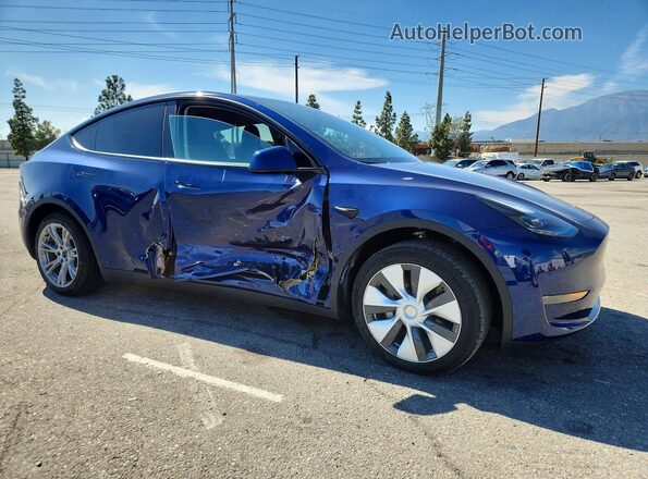 7SAYGDED9RF047465 2024 TESLA MODEL Blue Передня права чверть