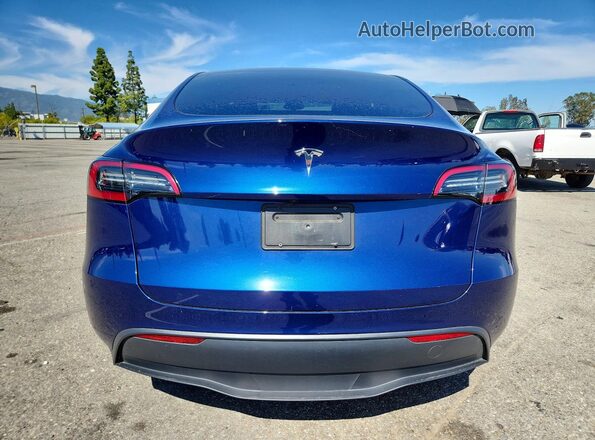 7SAYGDED9RF047465 2024 TESLA MODEL Blue Вид ззаду