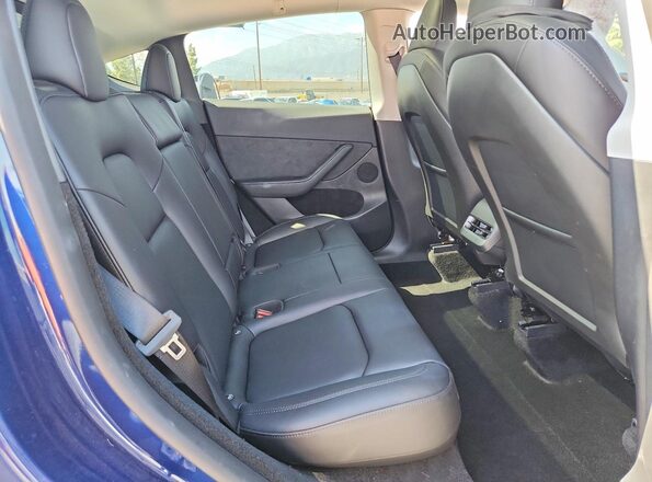 7SAYGDED9RF047465 2024 TESLA MODEL Blue Вид задньої частини салону