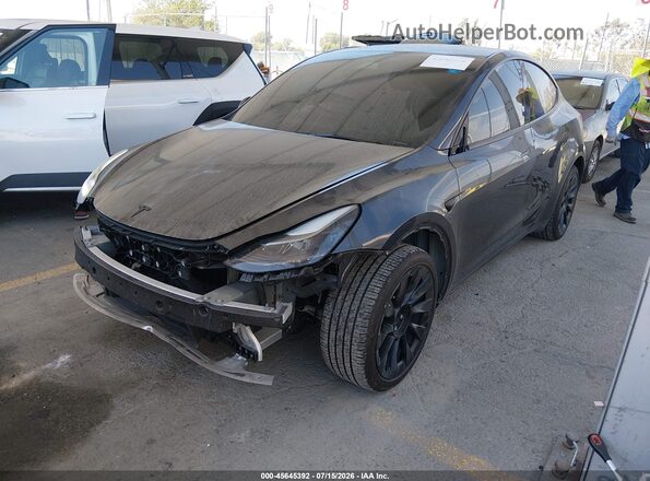 7SAYGDED9SF215319 2025 TESLA MODEL Y Black Передня ліва чверть