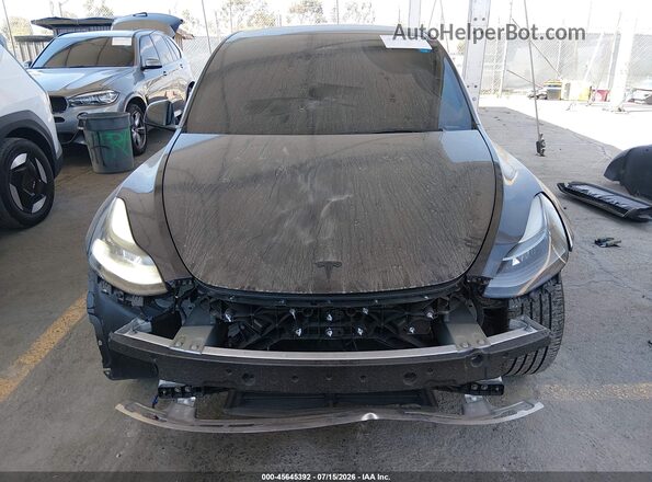 7SAYGDED9SF215319 2025 TESLA MODEL Y Black Вид задньої частини салону