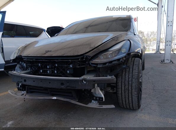 7SAYGDED9SF215319 2025 TESLA MODEL Y Black Вид спереду