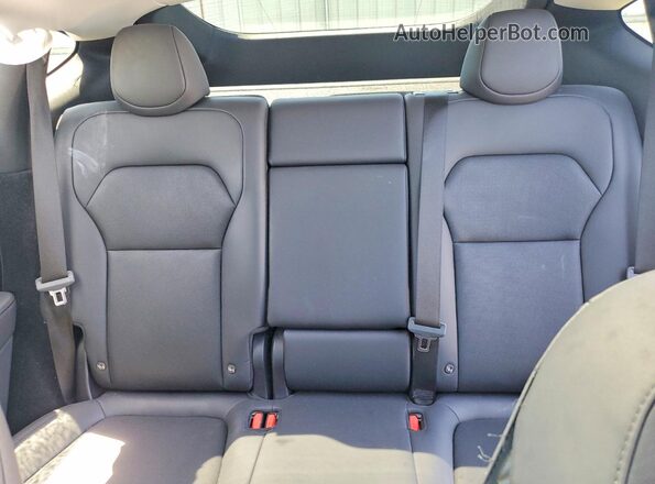7SAYGDED9TA436885 2026 TESLA MODEL Charcoal Vista de los asientos traseros
