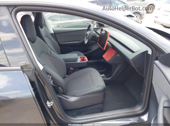7SAYGDED9TA587032 2026 TESLA MODEL Y Gray Front interior view