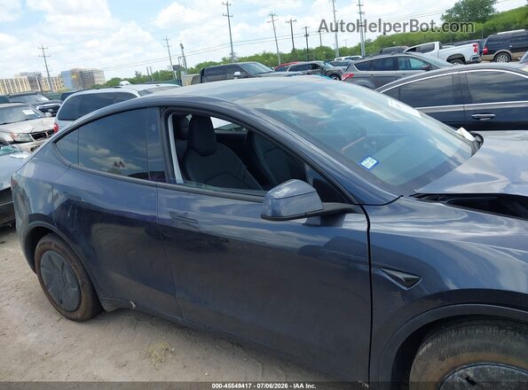 7SAYGDED9TA587032 2026 TESLA MODEL Y Gray Instrument cluster view