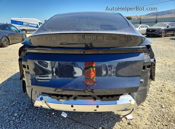 7SAYGDED9TA608445 2026 TESLA MODEL Charcoal Rear view