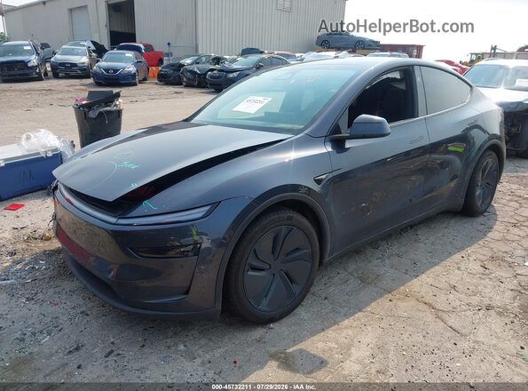 7SAYGDED9TA655006 2026 TESLA MODEL Y Gray წინა მარცხენა ხედი სამი მეოთხედიდან