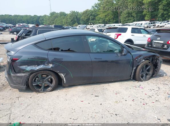 7SAYGDED9TA655006 2026 TESLA MODEL Y Gray უკანა სალონის ხედი