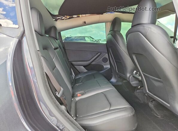 7SAYGDEDXRF190652 2024 TESLA MODEL Gray Rear interior view