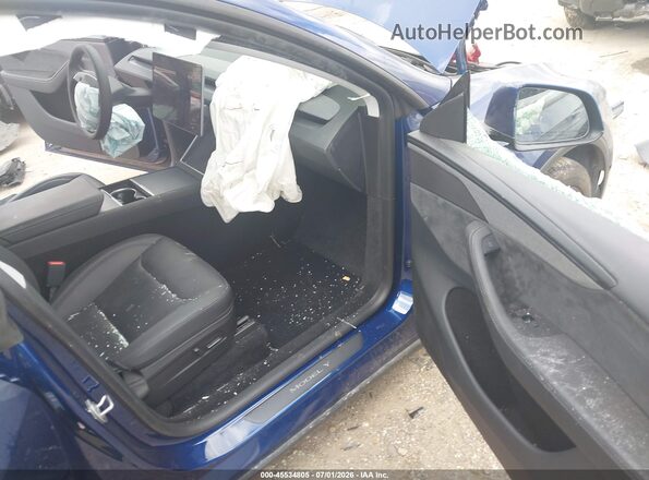 7SAYGDEDXTA470852 2026 TESLA MODEL Y Blue Front interior view