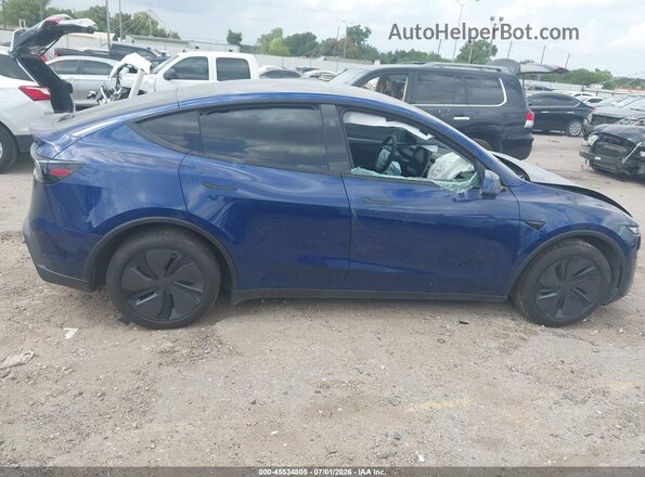 7SAYGDEDXTA470852 2026 TESLA MODEL Y Blue Dashboard view