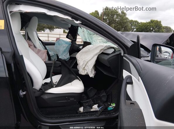 7SAYGDEDXTA611175 2026 TESLA MODEL Y Черный Вид салона спереди