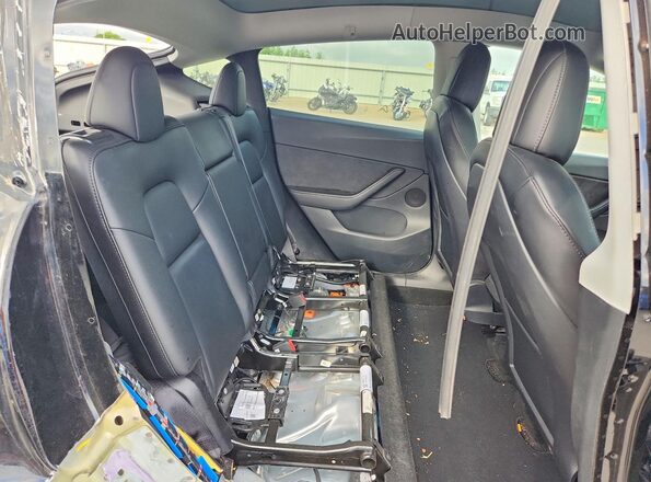 7SAYGDEE0NF426518 2022 TESLA MODEL Black Vista de los asientos traseros