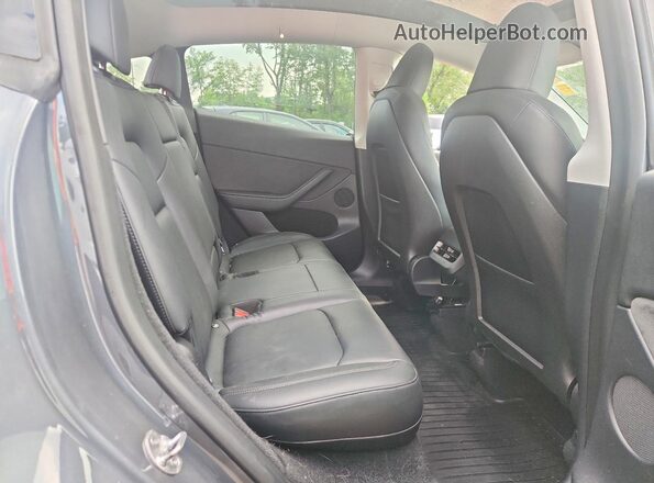 7SAYGDEE0PA040147 2023 TESLA MODEL Gray Vista de los asientos traseros