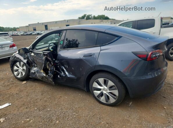 7SAYGDEE0PA040147 2023 TESLA MODEL Gray Trasero izquierdo