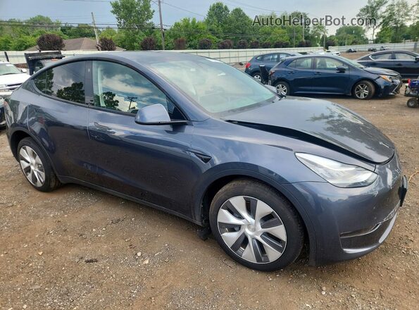 7SAYGDEE0PA040147 2023 TESLA MODEL Gray Delantero derecho
