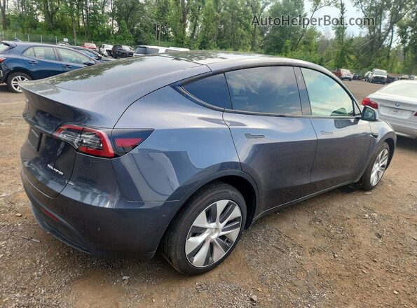 7SAYGDEE0PA040147 2023 TESLA MODEL Gray Trasero derecho