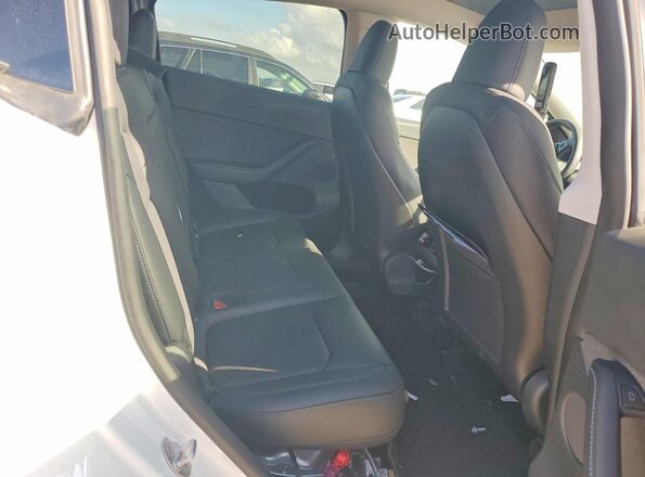 7SAYGDEE0PA077165 2023 TESLA MODEL White Rear seats view