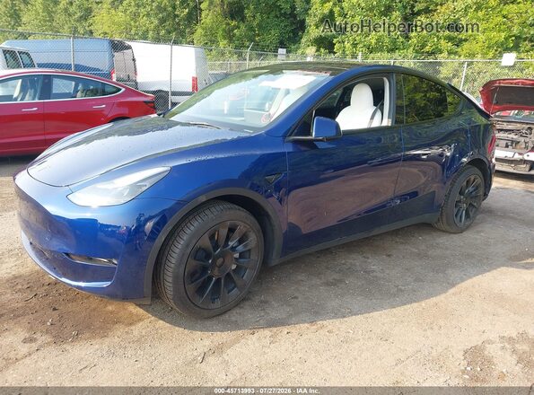 7SAYGDEE0PA174169 2023 TESLA MODEL Y Black Vista tres cuartos delantera izquierda
