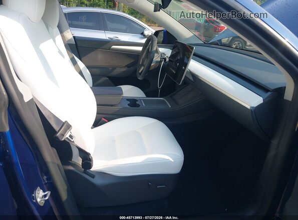 7SAYGDEE0PA174169 2023 TESLA MODEL Y Black Vista interior delantera