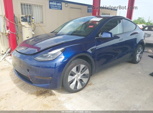 7SAYGDEE0PF864104 2023 TESLA MODEL Y Blue Vista tres cuartos delantera izquierda