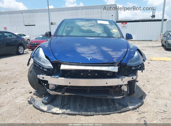 7SAYGDEE0RA251903 2024 TESLA MODEL Y Blue Սալոնի հետևի տեսք