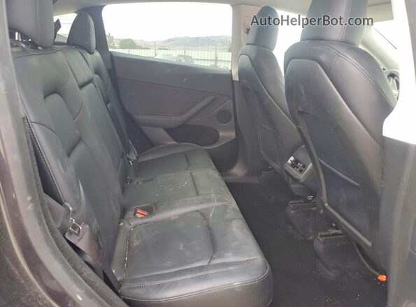 7SAYGDEE0RF158429 2024 TESLA MODEL Gray Вид задньої частини салону