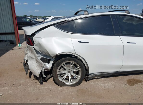 7SAYGDEE1NF407833 2022 TESLA MODEL Y Белый Вид салона спереди