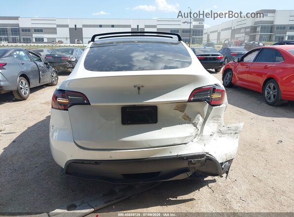 7SAYGDEE1NF407833 2022 TESLA MODEL Y Белый Вид задней части салона
