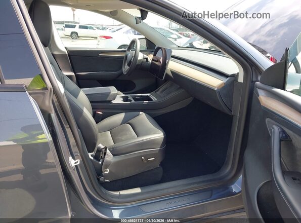 7SAYGDEE1PA024149 2023 TESLA MODEL Y Серый Вид салона спереди