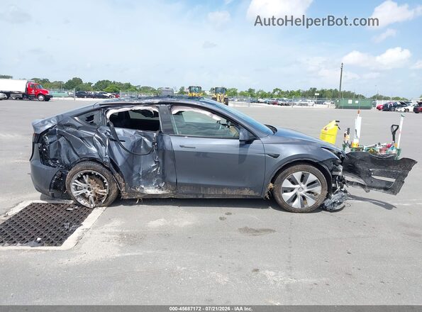7SAYGDEE1PA038858 2023 TESLA MODEL Y Серый Вид панели приборов