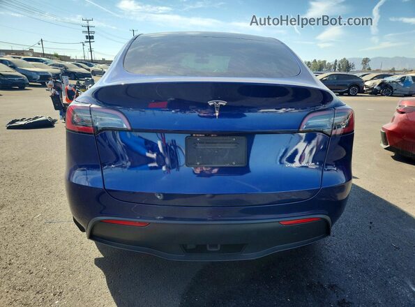 7SAYGDEE1PA124414 2023 TESLA MODEL Blue Հետևի տեսք