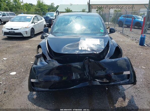 7SAYGDEE1PA183186 2023 TESLA MODEL Y Black Vista interior trasera